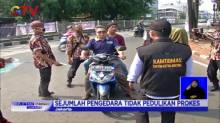 Polisi dan Ormas Gelar Sidak Masker di Tugu Proklamasi Jakarta