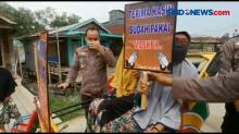 Takut Divaksin, Petugas Bujuk Rayu Lansia di Kampung Nelayan Jambi