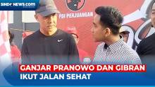 Gubernur Jawa Tengah Ganjar Pranowo Ajak Gibran Rakabuming Ikut Jalan Sehat di Kota Solo