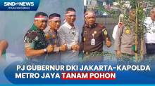 Pj Gubernur DKI Heru Budi-Kapolda Metro Jaya Tanam Pohon di Bantaran Kali Jakbar