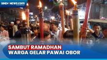 Sambut Ramadhan, Ratusan Warga Gelar Pawai Obor Keliling Kampung