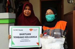 Olymp Trade Bantu Keluarga Kurang Mampu di Indonesia