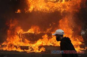 Pos Polantas Simpang Harmoni Dibakar Massa