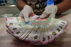 Viral Tukang Sate Tolak Uang Pecahan Rp75.000, BI: Uang Itu Sah