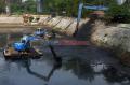Antisipasi Banjir, DSDA DKI Jakarta Keruk Lumpur di Waduk Setiabudi Barat
