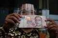 MAKI Serahkan Uang 100.000 Dollar Singapura ke KPK Diduga dari Orang Djoko Tjandra