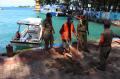 Petugas Gabungan Gelar Razia Masker di Kepulauan Seribu
