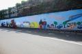 Sambut HUT DKI, Petugas PPSU Percantik Tembok dengan Mural Imbauan Prokes