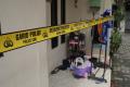 Garis Polisi Terpasang di Lokasi Rumah Pembunuhan Empat Orang Anak