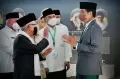 Penampilan Presiden Jokowi Pakai Sarung ke Acara Pengukuhan PBNU di Balikpapan