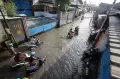 Banjir Rendam Jalan dan Permukiman Warga di Sidoarjo