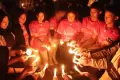 Gagal Jadi Tuan Rumah Piala Dunia U-20, Suporter Nyalakan 1.000 Lilin Simbol Harapan Indonesia Bangkit