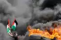 Kutuk Serangan Brutal Israel, Pengunjuk Rasa Bakar Puluhan Ban Bekas di Pagar Perbatasan Israel-Gaza