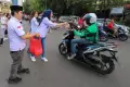 DPW Pemuda Perindo DKI Jakarta Bagi-Bagi Takjil di Kawasan Benhil