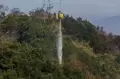Heli Water Bombing Padamkan Sisa Kebakaran Kawasan Bromo