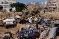 Mayat Korban Membusuk, Tim SAR Semprot Disinfektan di Lokasi Banjir Libya