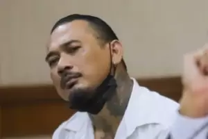 Jerinx SID Tak Sabar Lihat Adam Deni Pakai Baju Tahanan: Mohon Kepada Kepolisian