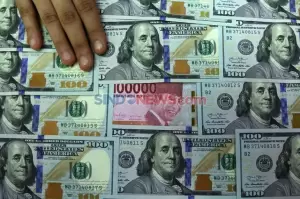 Dolar AS Tumbang, Rupiah Ditutup Menguat di Level Rp14.555
